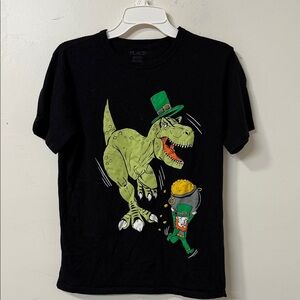 Place Black Shirt with Green Dinosaur and Leprechaun